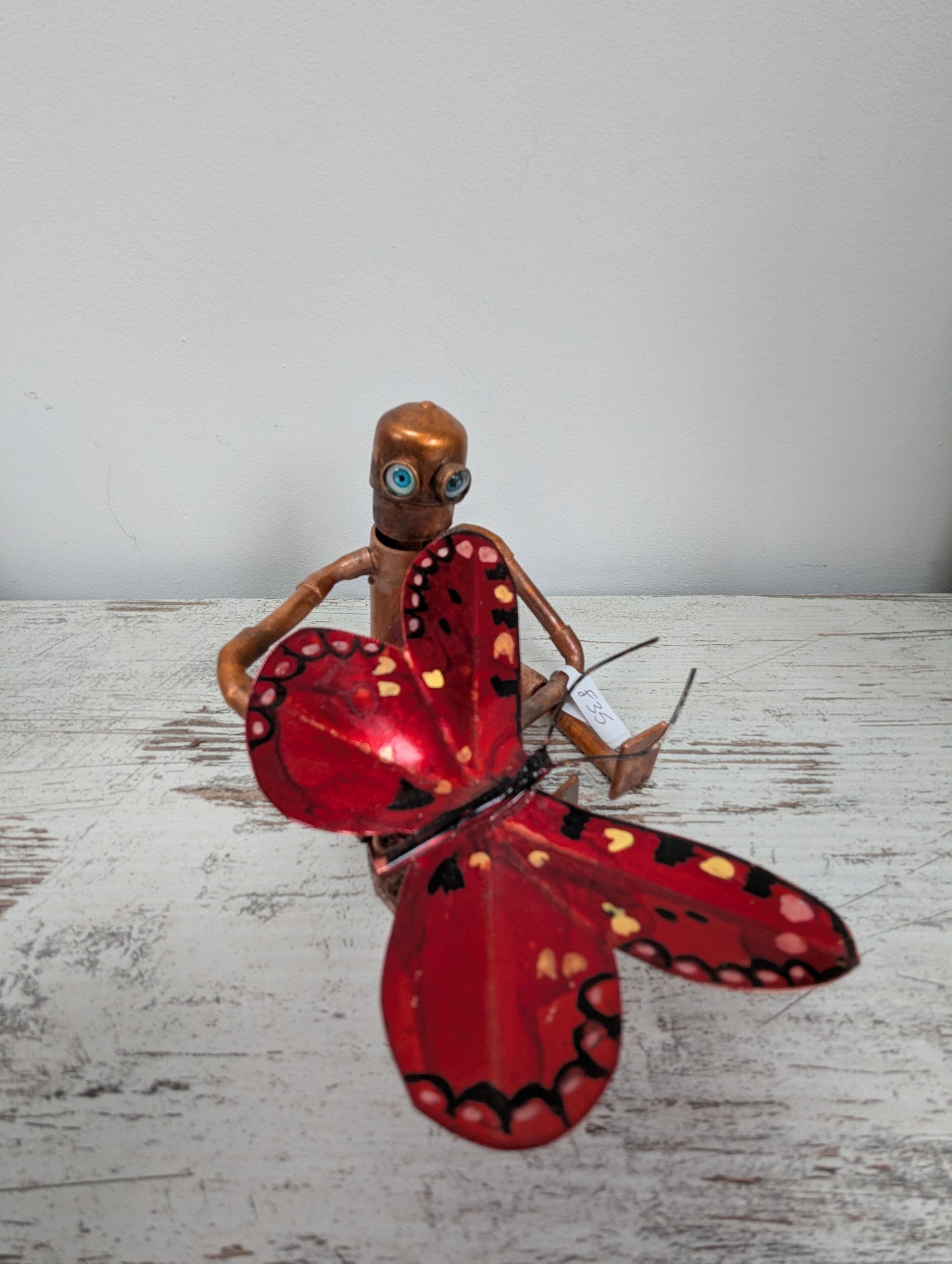 Robot holding a butterfly - Deshca Designs