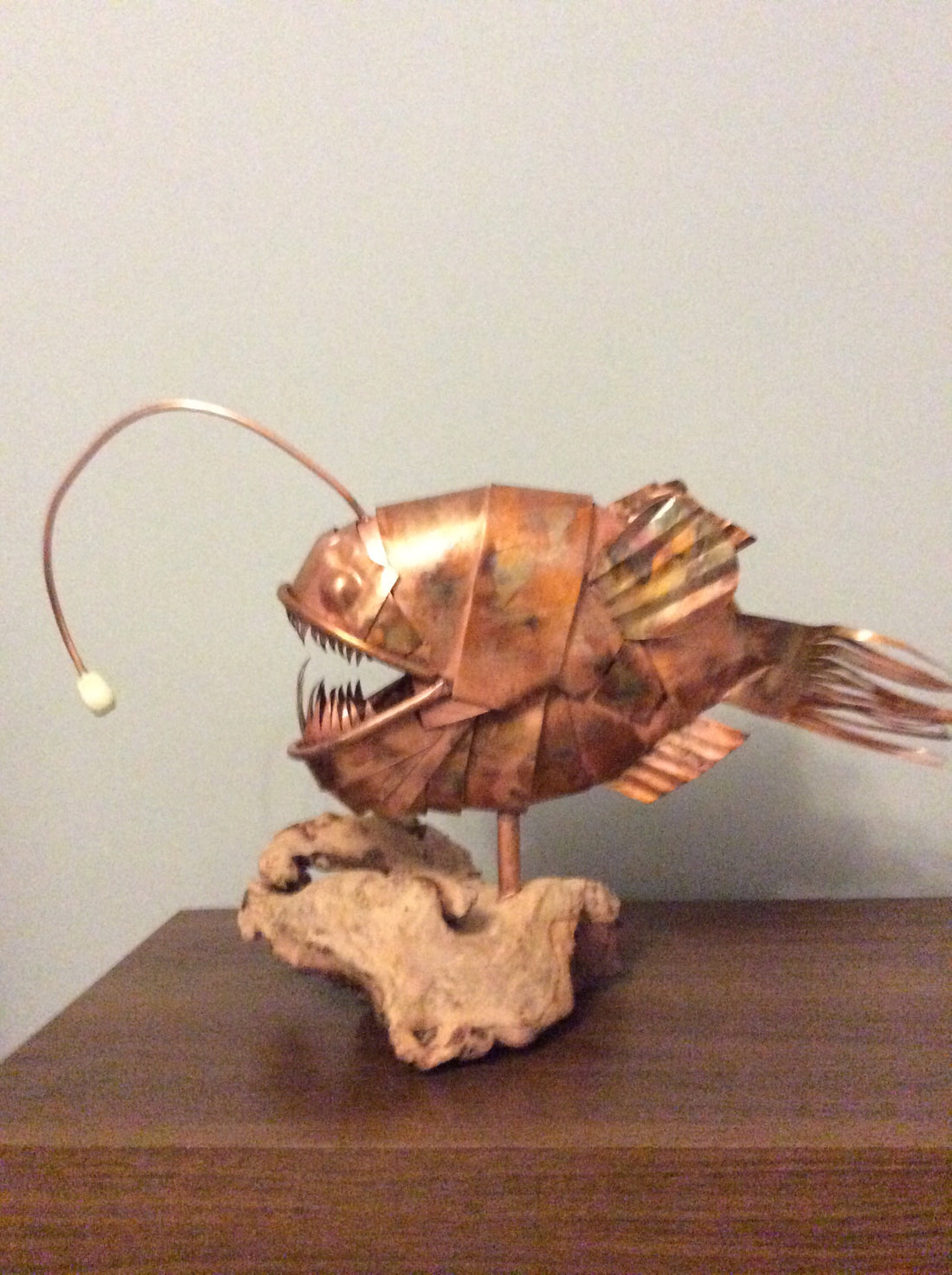 Copper anglerfish sculpture