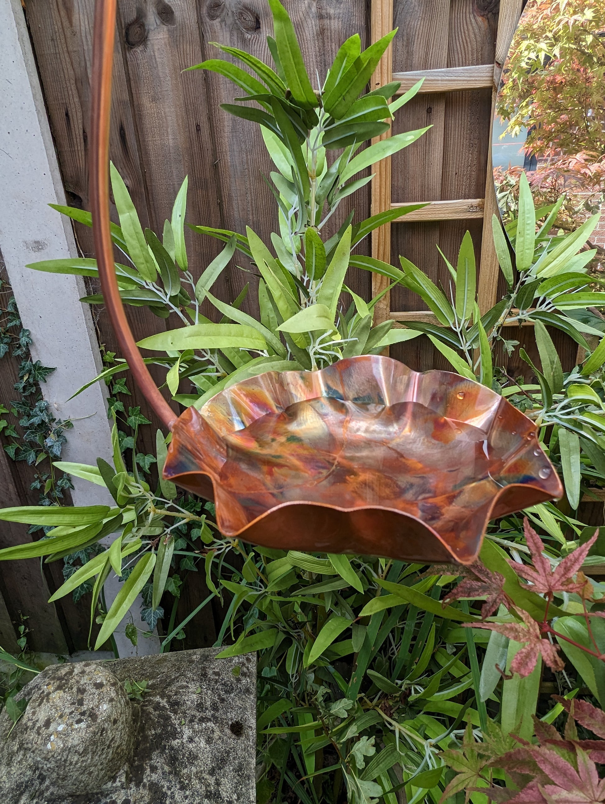 Copper bird bath