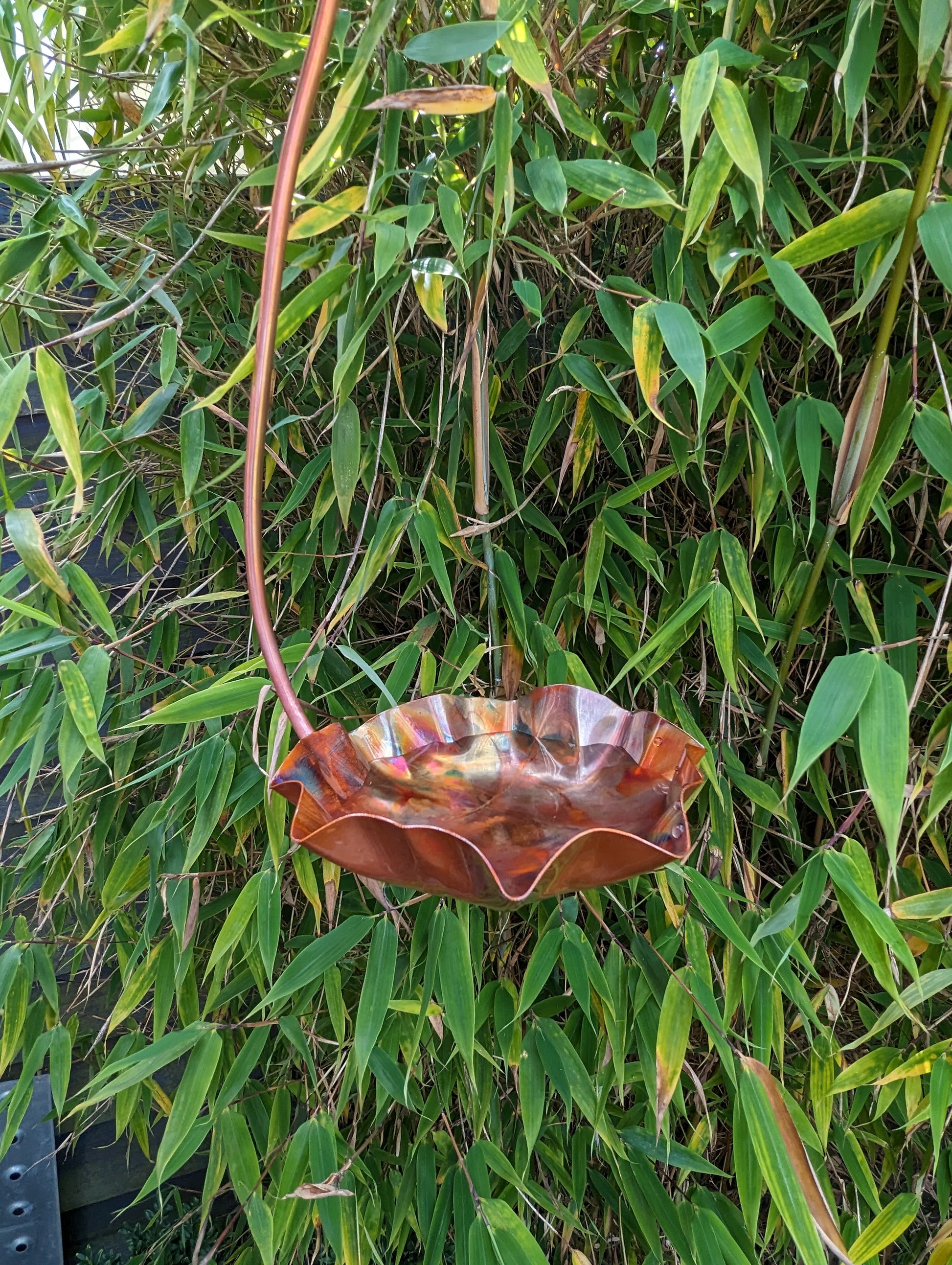 Copper hanging bird bath