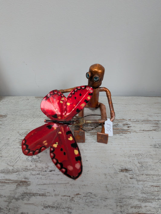 Robot holding a butterfly - Deshca Designs