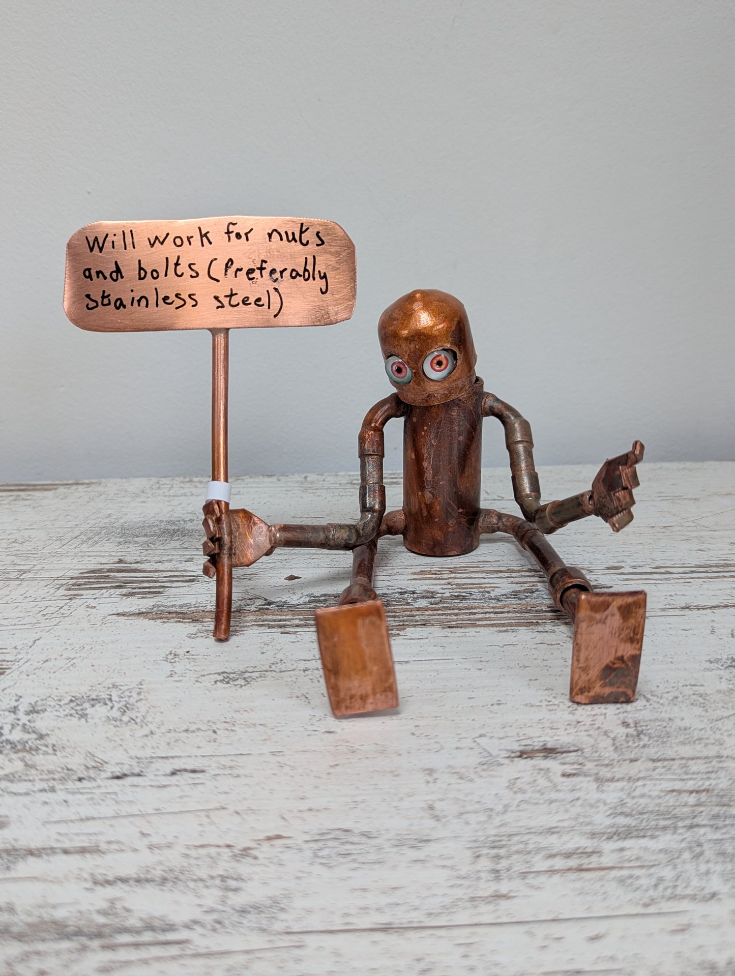 Placard waving robot - Deshca Designs