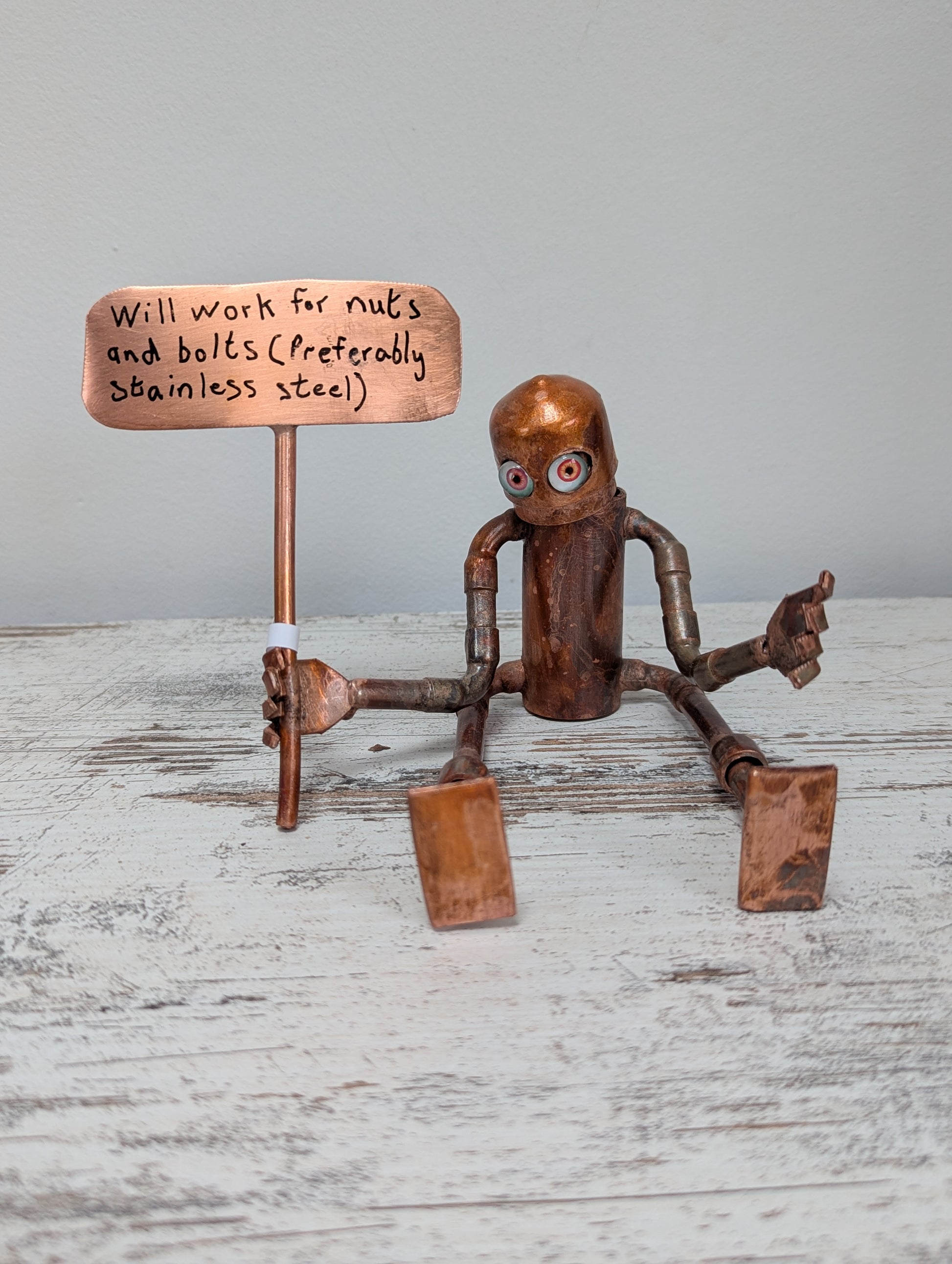 Placard waving robot - Deshca Designs