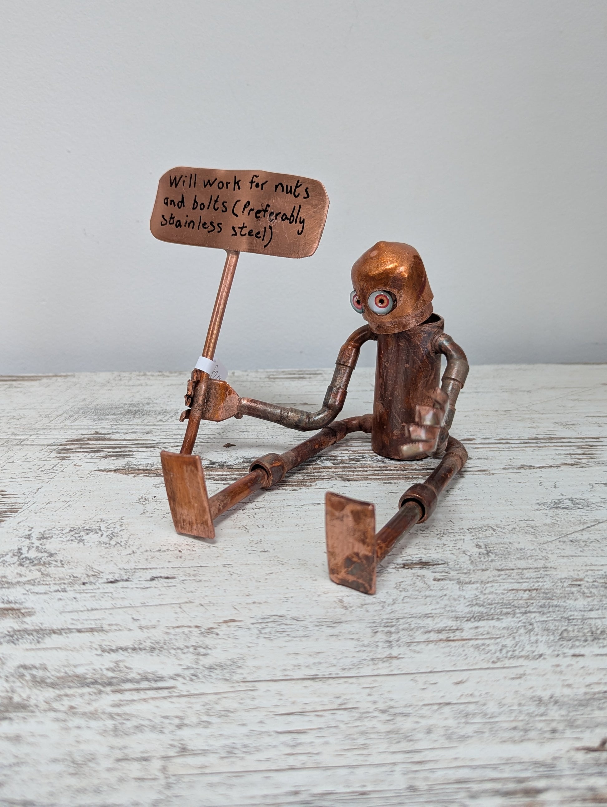 Placard waving robot - Deshca Designs