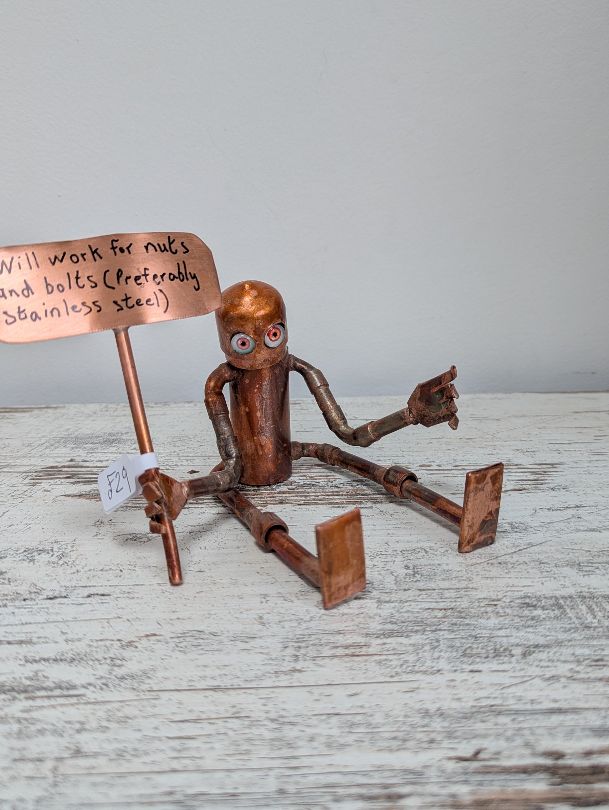 Placard waving robot - Deshca Designs