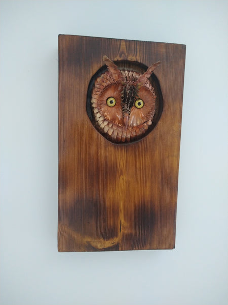 Long-eared owl copper sculpture