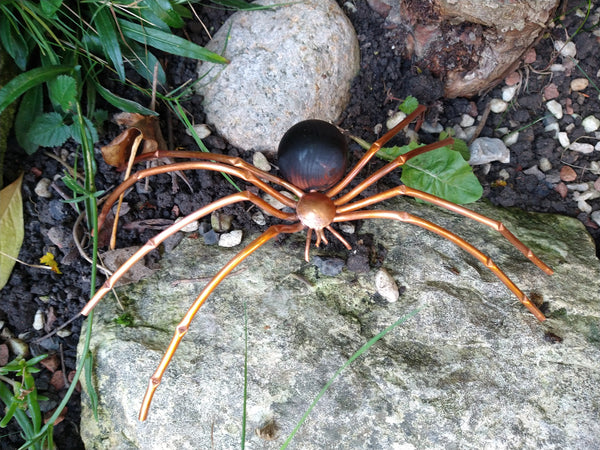 Copper spider sculpture
