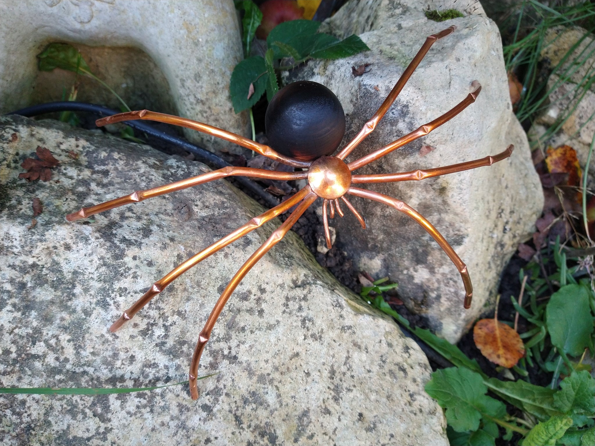 Metal spider sculpture