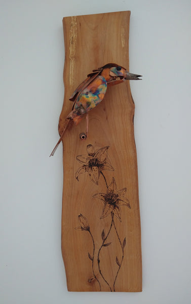 Copper bird and pyrography flowers